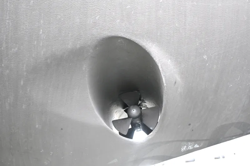 Slide: The Image of Close-up of a 2006 Waterline 50 boat's bow thruster propeller. - 122