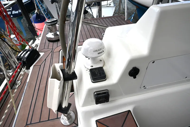 Slide: The Image of Cockpit of 2006 Waterline 50 yacht with navigation equipment and wooden deck. - 31