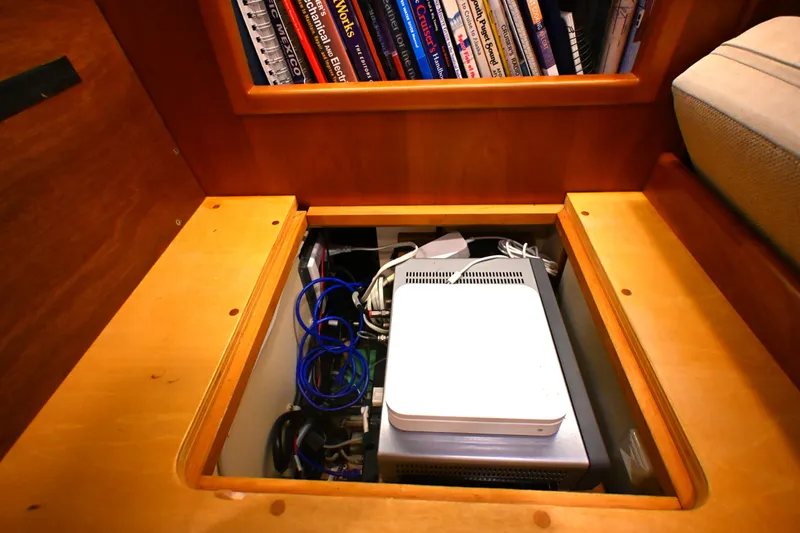 Slide: The Image of Hidden compartment with electronic equipment and cables on a Waterline 50 yacht, 2006 model. - 83