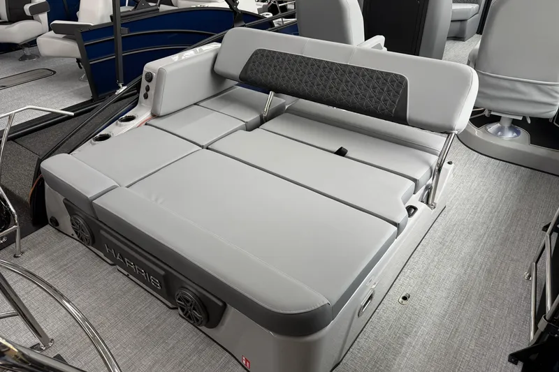 Slide: The Image of 2026 Harris Solstice 230 SLDH boat interior with luxurious gray seating and modern design. - 10