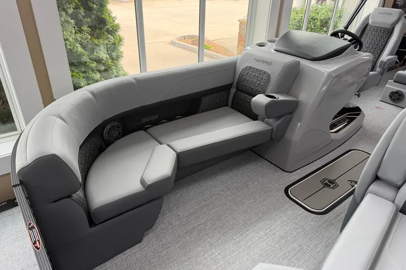 Slide: The Image of Luxurious interior of 2026 Harris Solstice 230 SLDH pontoon boat with plush seating. - 3