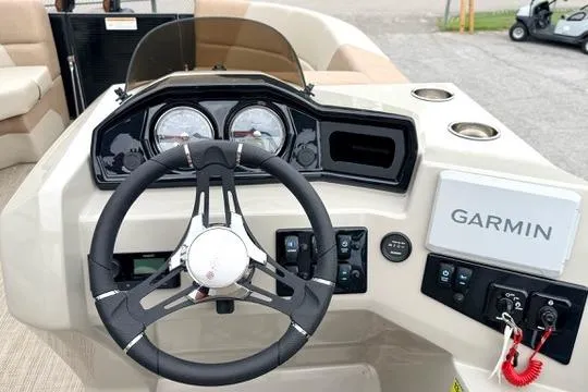 Slide: The Image of Steering console of 2026 Manitou Aurora RF 23 with Garmin navigation system. - 10