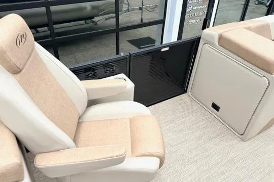 Slide: The Image of Luxurious seating on the 2026 Manitou Aurora RF 23 pontoon boat interior. - 7