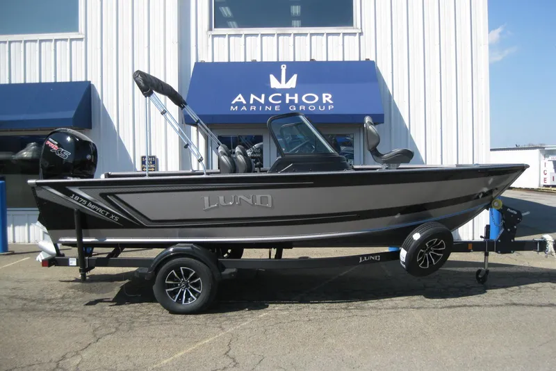 Slide: The Image of 2026 Lund 1875 Impact XS Sport boat on trailer at Anchor Marine Group. - 10