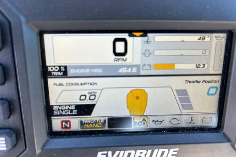Slide: The Image of Evinrude engine display on 2017 Robalo R227 Dual Console, showing RPM and fuel consumption. - 13