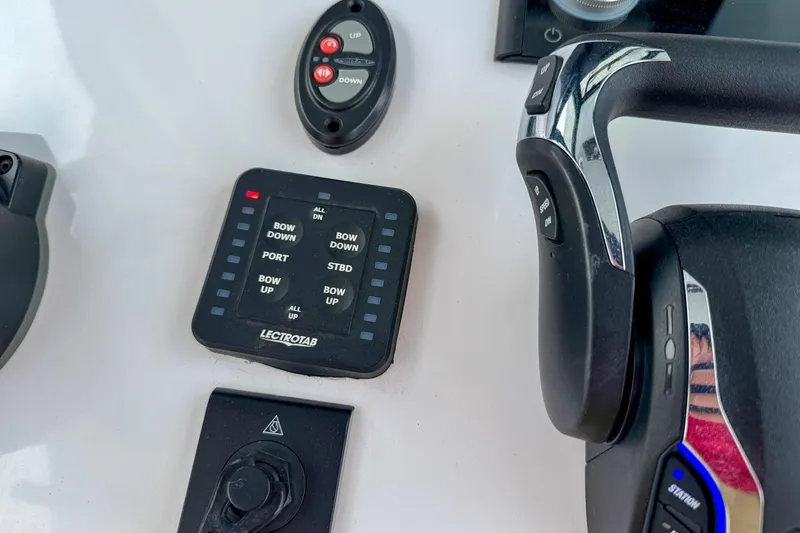 Slide: The Image of Fusion audio system on 2023 Sportsman Heritage 261 Center Console boat dashboard. - 13