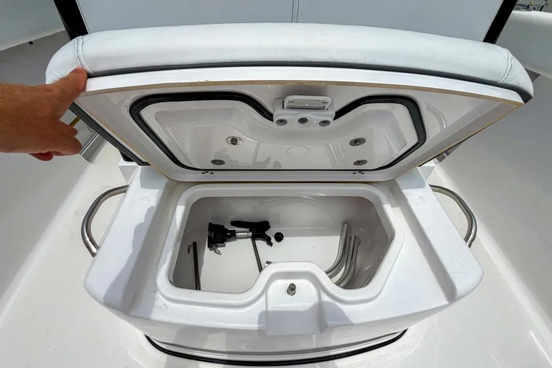 Slide: The Image of 2023 Sportsman Heritage 261 Center Console interior with storage and safety equipment. - 34