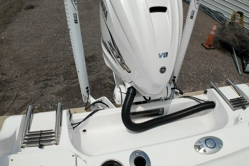 Slide: The Image of 2023 Sportsman Heritage 261 Center Console boat on trailer, featuring Yamaha outboard engine. - 46