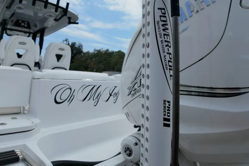 Slide: The Image of 2023 Sportsman Heritage 261 Center Console boat on trailer with Yamaha engine. - 63