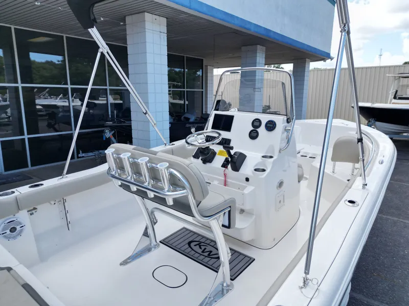 Slide: The Image of Key West 203 FS boat 2026, modern design, helm console, seating area. - 12