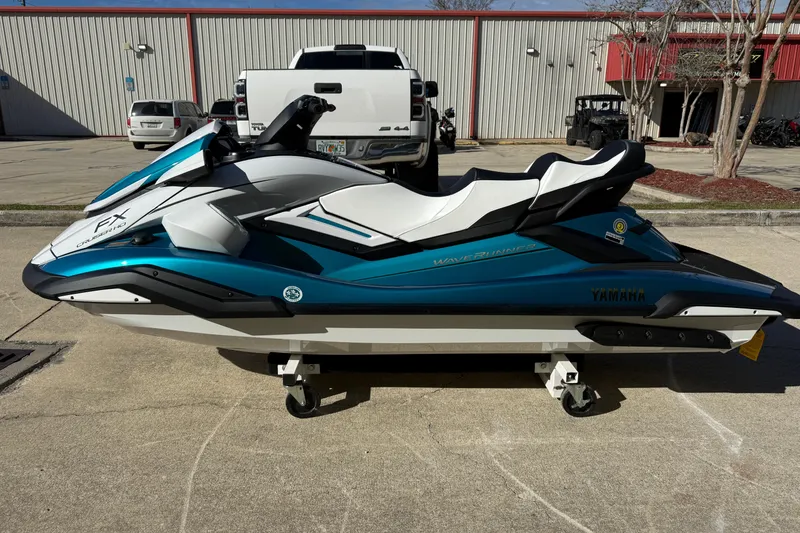 Slide: The Image of 2026 Yamaha WaveRunner FX Cruiser HO in a parking lot, showcasing sleek design and vibrant colors. - 7