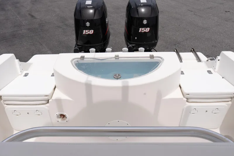 Slide: The Image of 2010 Sea Fox 256 Center Console boat with dual Suzuki 150 engines. - 18