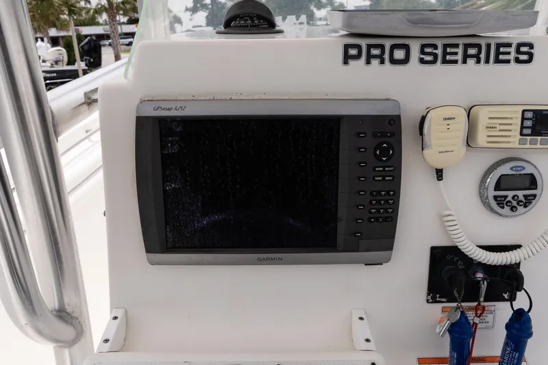 Slide: The Image of Control panel of a 2010 Sea Fox 256 Center Console boat with Garmin GPSmap 4212. - 23
