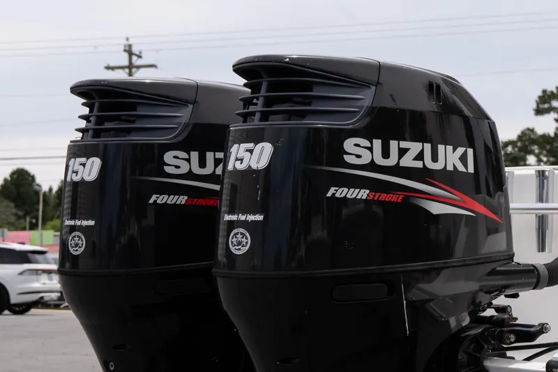 Slide: The Image of Twin Suzuki 150 horsepower four-stroke outboard engines on a 2010 Sea Fox 256 Center Console. - 6