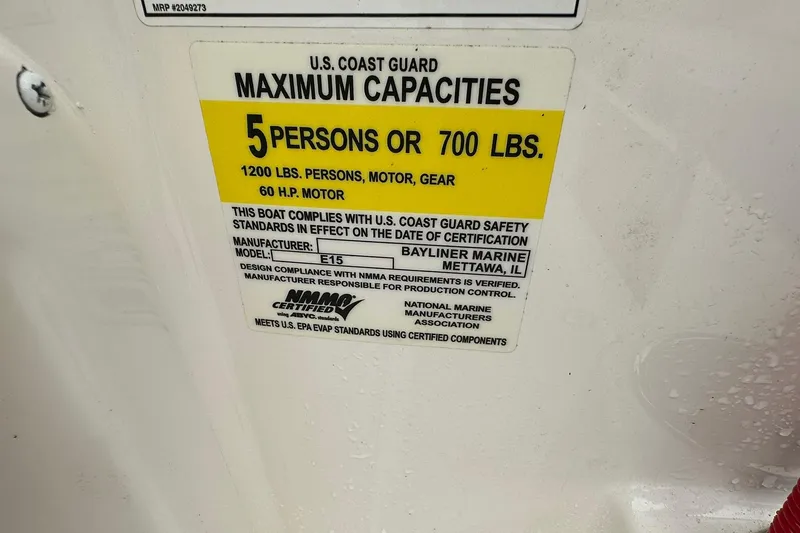 Slide: The Image of 2024 Bayliner Element M15 capacity label: 5 persons or 700 lbs, 60 HP motor. - 12