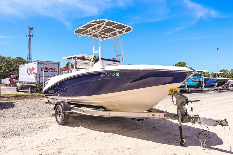 The Image of 2017 Yamaha Boats 190 FSH Sport on trailer in outdoor setting. - 1