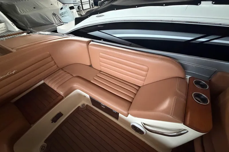 Slide: The Image of Luxurious interior of 2013 Chris-Craft Launch 25 boat with tan leather seating. - 15