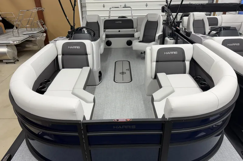 Slide: The Image of 2026 Harris Cruiser 210 SLDH pontoon boat with spacious seating and modern design. - 2
