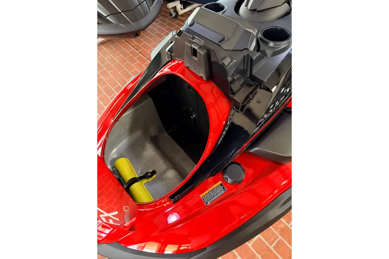 Slide: The Image of 2026 Yamaha WaveRunner FX Cruiser HO, red and black, open storage compartment. - 14