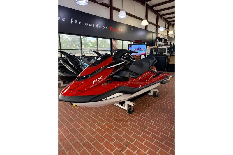 Slide: The Image of 2026 Yamaha WaveRunner FX Cruiser HO in showroom, red color, on display stand. - 3