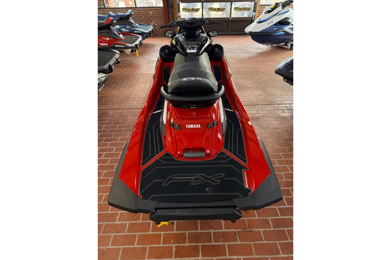 Slide: The Image of 2026 Yamaha WaveRunner FX Cruiser HO in showroom, red and black design. - 4