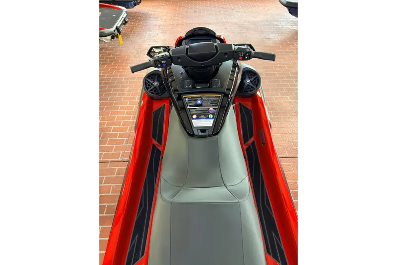 Slide: The Image of 2026 Yamaha WaveRunner FX Cruiser HO, red and gray seat, top view, brick floor background. - 5
