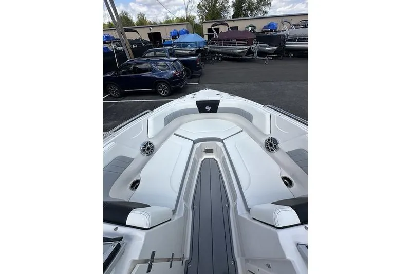 Slide: The Image of 2023 Chaparral 23 Surf boat interior with sleek seating and modern design. - 22