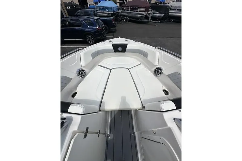 Slide: The Image of 2023 Chaparral 23 Surf boat interior with sleek seating and modern design. - 34