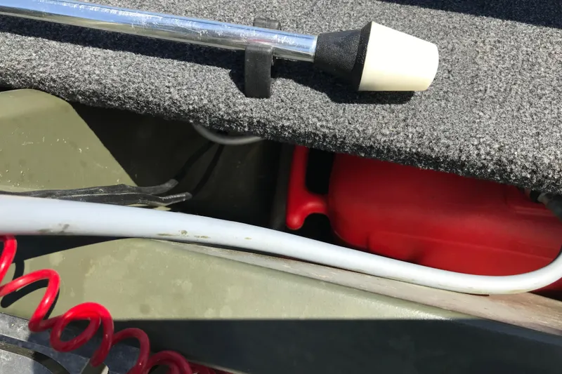 Slide: The Image of Interior view of a 1992 Alweld 1856VV boat showing equipment and storage. - 9