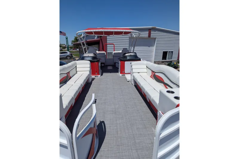 Slide: The Image of 2025 PlayCraft 3000 XTREME pontoon boat with spacious seating and modern design. - 11