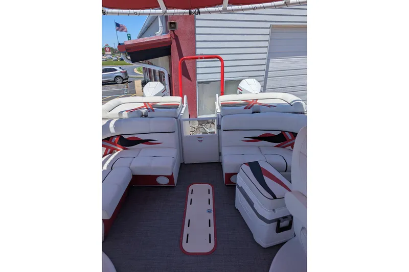 Slide: The Image of Interior of 2025 PlayCraft 3000 XTREME boat with stylish seating and modern design. - 8