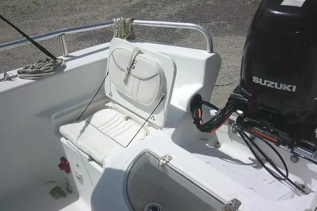 Slide: The Image of 2009 Carolina Skiff 198 DLV Elite boat interior with Suzuki outboard motor. - 20