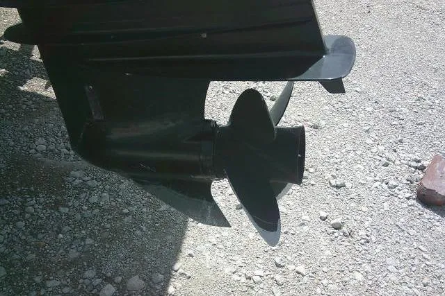 Slide: The Image of Propeller of a 2009 Carolina Skiff 198 DLV Elite on gravel surface. - 8