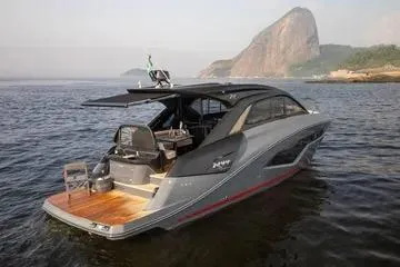 Slide: The Image of 2025 NX Boats NX44 PININFARINA luxury yacht cruising near scenic coastline. - 3