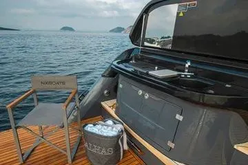 Slide: The Image of Luxury NX44 PININFARINA yacht deck with seating and ocean view, 2025 model. - 8
