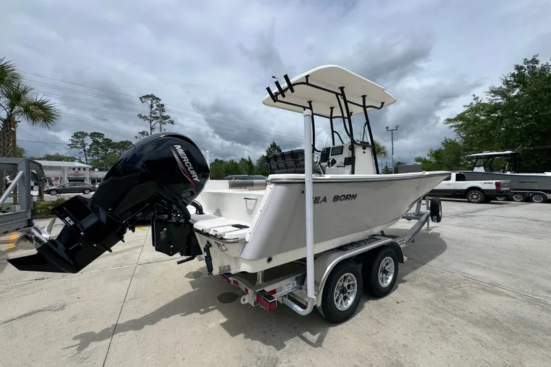 Slide: The Image of 2026 Sea Born LX21 Center Console boat on trailer with Mercury outboard motor. - 10