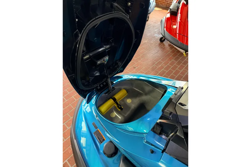 Slide: The Image of 2026 Yamaha WaveRunner FX Cruiser SVHO with open storage compartment, displayed indoors. - 12