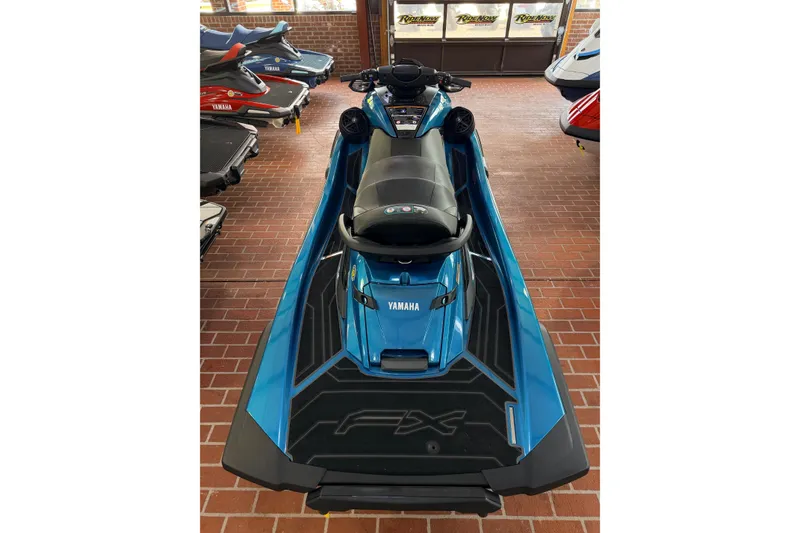 Slide: The Image of 2026 Yamaha WaveRunner FX Cruiser SVHO in showroom, blue color, sleek design. - 3
