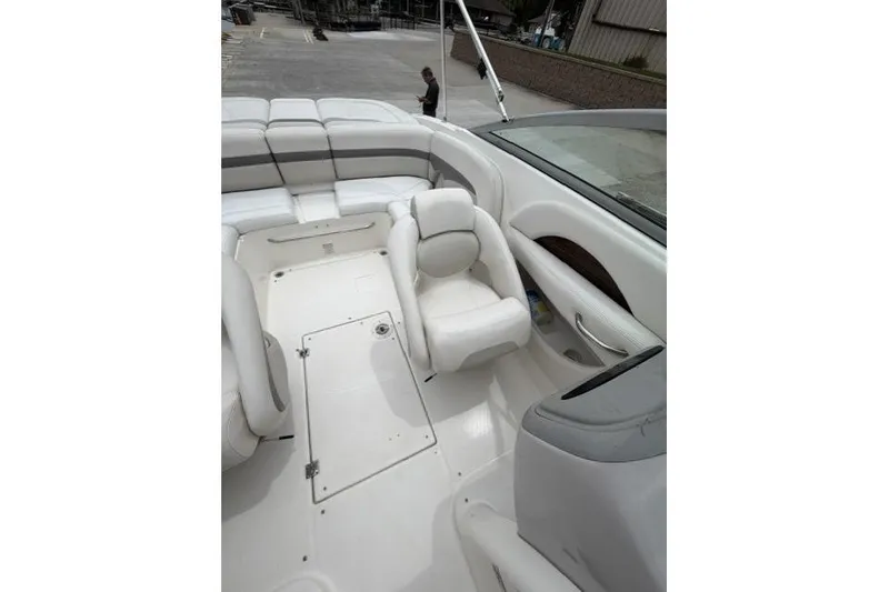 Slide: The Image of 2007 Chaparral 236 SSi boat interior with white seating and sleek design. - 7