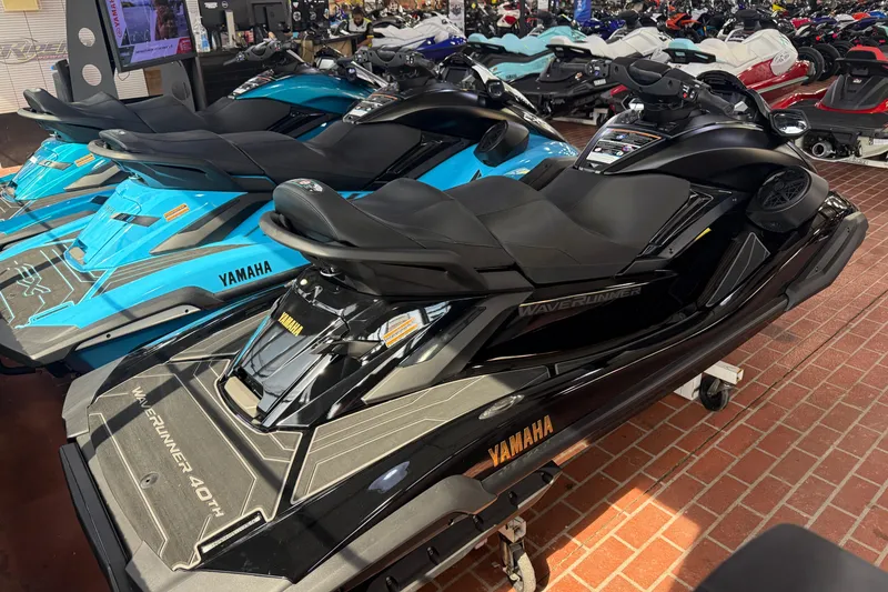 Slide: The Image of 2026 Yamaha WaveRunner FX Limited SVHO jet skis displayed in a showroom. - 11