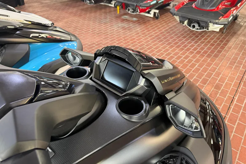 Slide: The Image of 2026 Yamaha WaveRunner FX Limited SVHO dashboard with digital display and cup holders. - 13