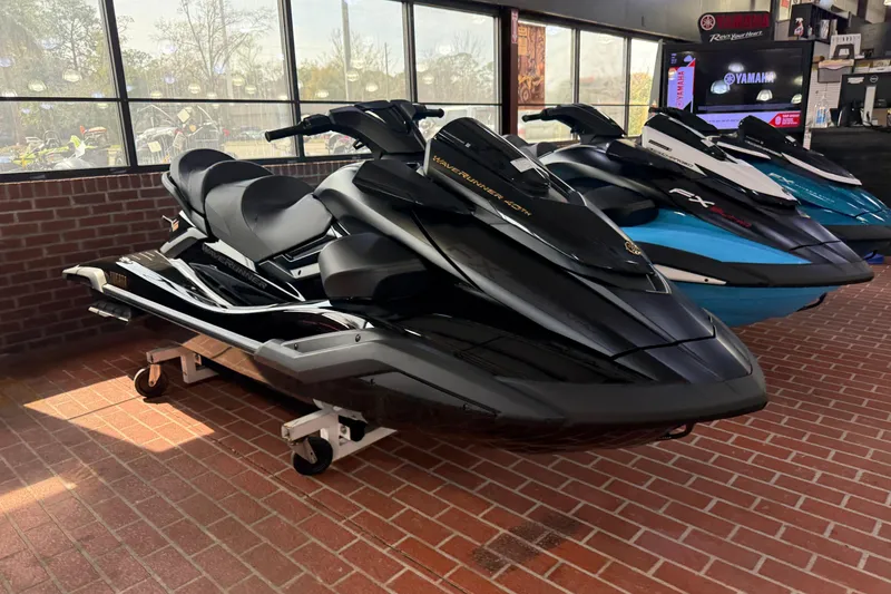 Slide: The Image of 2026 Yamaha WaveRunner FX Limited SVHO in showroom, sleek black design on display. - 4