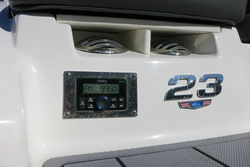 Slide: The Image of 2024 Chaparral 23 SSi OB boat with Clarion stereo and model emblem. - 31