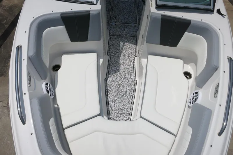 Slide: The Image of 2024 Chaparral 23 SSi OB boat interior with spacious seating and modern design. - 46