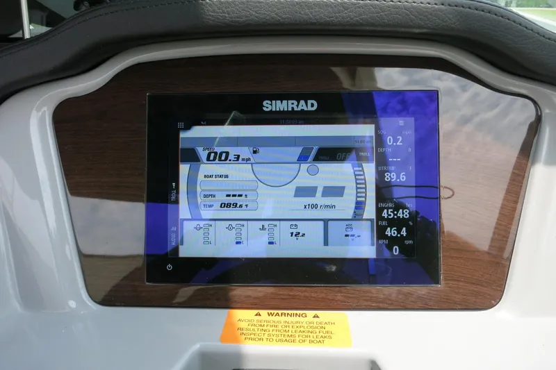 Slide: The Image of Dashboard display of 2024 Chaparral 23 SSi OB boat with Simrad electronics. - 63