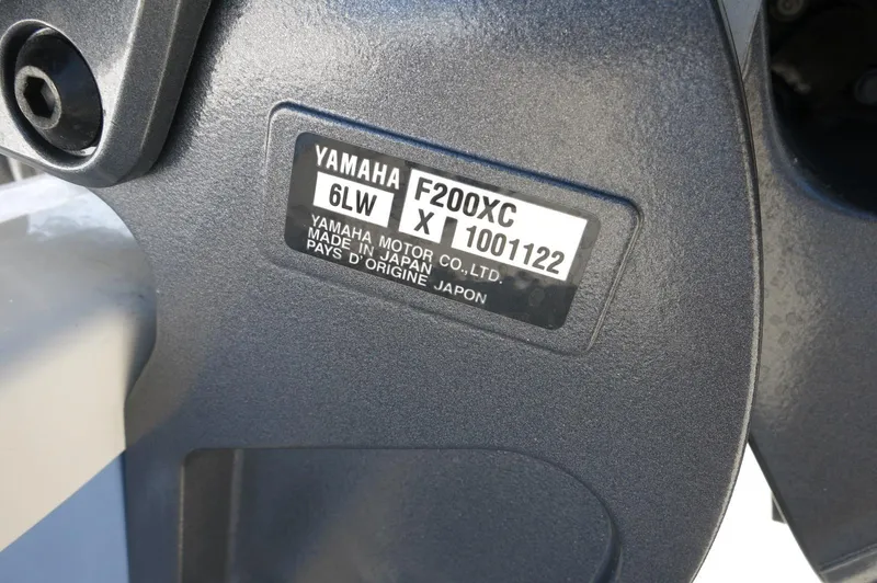 Slide: The Image of Yamaha F200XC engine label on 2024 Chaparral 23 SSi OB boat. - 68