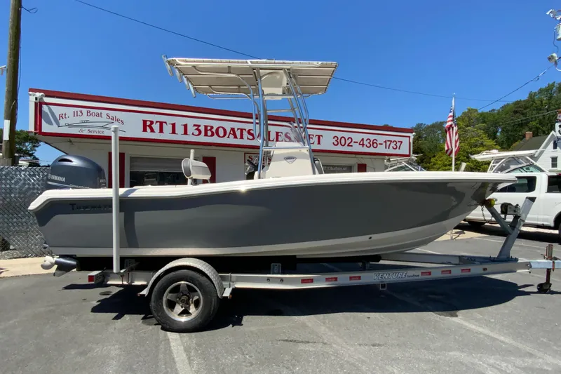 The Image of 2015 Tidewater 198 CC Adventure boat on trailer at RT 113 Boat Sales. - 1