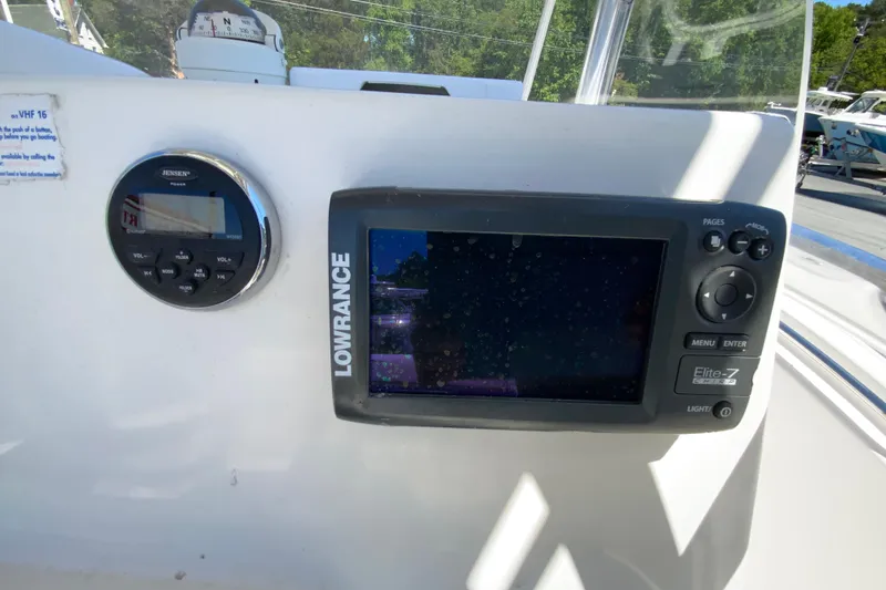 Slide: The Image of Control panel of 2015 Tidewater 198 CC Adventure boat with Lowrance Elite-7 display. - 12