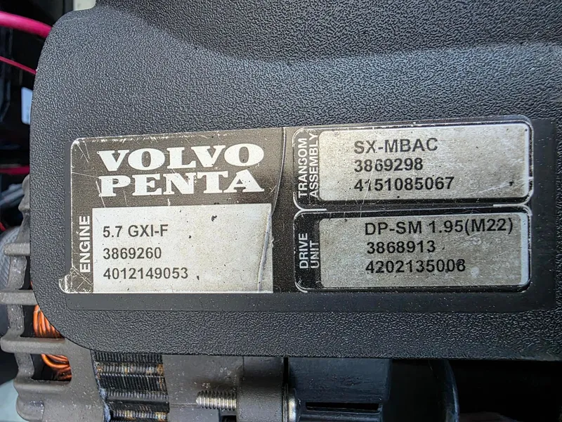 Slide: The Image of Close-up of a Volvo Penta engine plate with technical details. - 28
