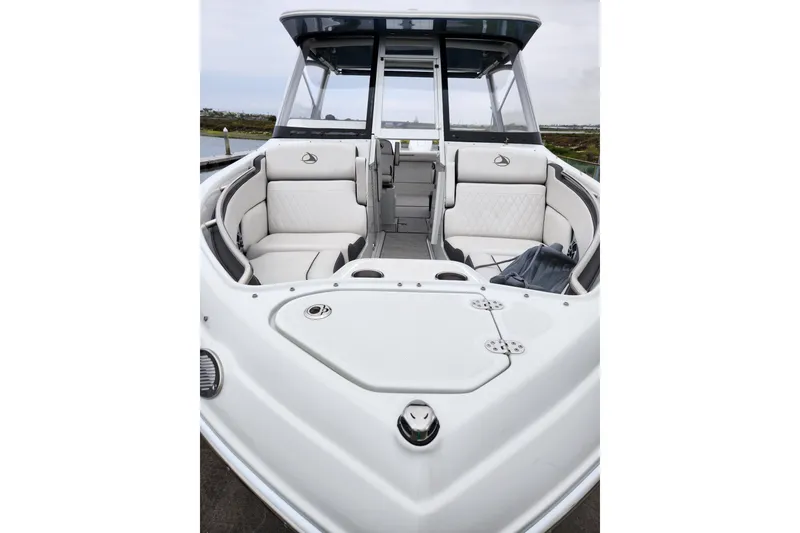Slide: The Image of 2022 Finseeker 280 DC boat interior with luxurious seating and modern design. - 10
